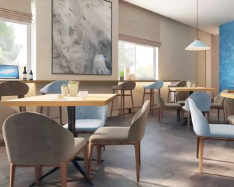 Home Inn Neo Mudanjiang Railway Station Dashang New Mart - Mudanjiang - Restaurant