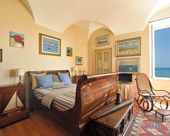 Casa d'artista B&B di Charme - Alassio - Camera da letto