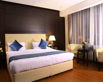 The Olive Hotel, Juffair - Manama - Schlafzimmer