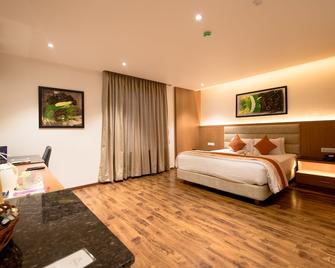 Kyriad Hotel Gulbarga By Othpl - Gulbarga - Bedroom