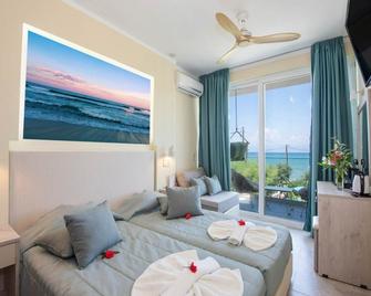 Angela Beach Hotel - Roda - Bedroom