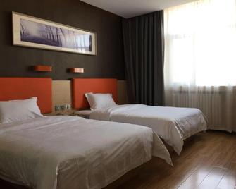 7Days Premium Xingtai Zhongxing West Street Gushun Branch - Xingtai - Schlafzimmer