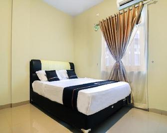 OYO 2659 B'rasco Homestay Syariah - Duri - Bedroom