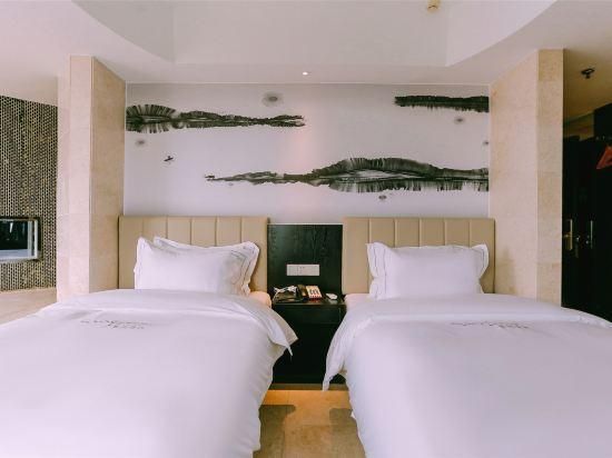 Qingmu Hotel Ma'anshan Xinming International Boutique - מא'אנשאן - חדר שינה