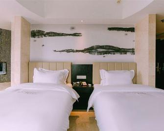 Qingmu Hotel Ma'anshan Xinming International Boutique - Ma'anshan - Bedroom