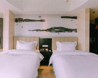 Qingmu Hotel Ma'anshan Xinming International Boutique - מא'אנשאן - חדר שינה