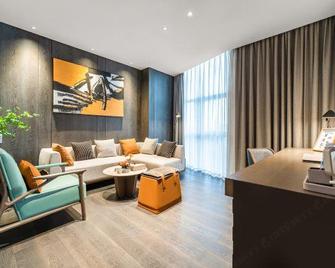 Nishi Haitai Hotel - Jinan - Sala de estar