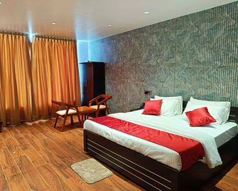 The Universal Hotel - Bongaigaon - Bedroom