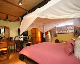 A Fei Surf Inn II - Tiki House - Hengchun Township - Bedroom
