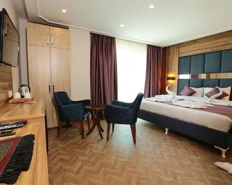 Royal Palas Hotel - Van - Schlafzimmer