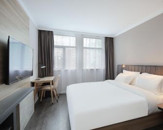 Hanting Premium Hotel Nanjing Zhonghuamen Metro Station - Nanjing - Soveværelse