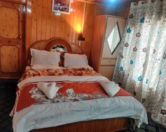 Goroomgo Roseland Cottage Gulmarg - Gulmarg - Slaapkamer