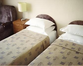 Hotel 24 Chasa - Barnaul - Bedroom