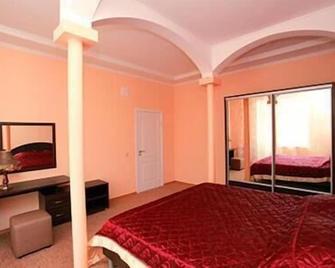 Ataman Hotel - Toljatti - Slaapkamer