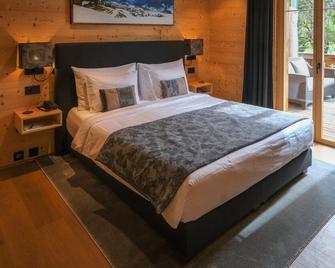 Hotel-Restaurant Valrose - Rougemont - Schlafzimmer