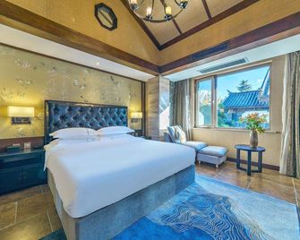 Share Year Hotel - Lijiang - Habitación