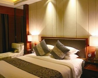 Ruixiang New Century Hotel - Chuzhou - Slaapkamer