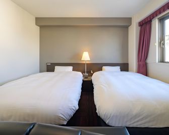 Center One Hotel Handa - Handa - Chambre