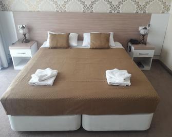 Nicea Hotel - סלקוק - חדר שינה