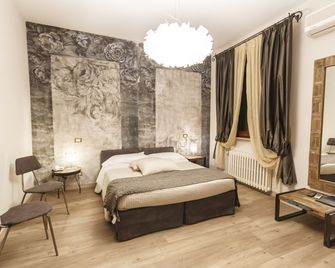 Agrihotel Villa Ambra - מונטפולצ'אנו - חדר שינה