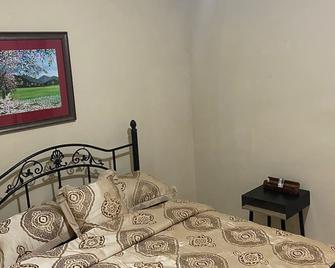 Marlon’s cosy one bedroom apartmentbr - Port of Spain - Habitació