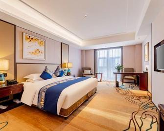Ordos Taihua Langjing Hotel - Ordos City - Ložnice