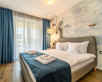 Promenada Studios - Braşov - Chambre