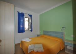 Holiday immersed in nature pampered by services, friendliness and availability. - Vieste - Schlafzimmer