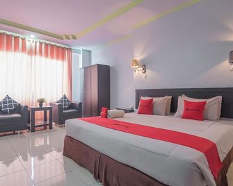 RedDoorz Syariah at Grand Taufiq Tarakan - Tarakan - Bedroom