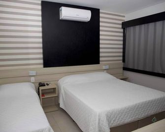 Mogano Express Hotel - Chapecó - Slaapkamer