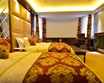 Bremen Hotel Harbin Central Street - Harbin - Yatak Odası