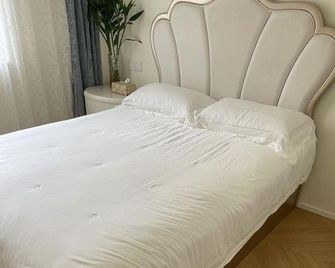 Huasheng Express Hostel - Dalian - Habitación