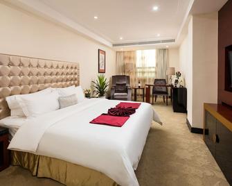Gorgeous Hotel - Guangzhou - Schlafzimmer