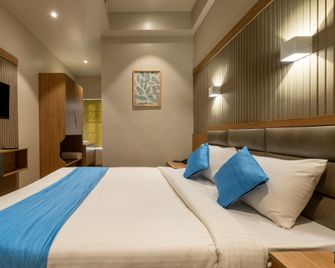 Hotel Mint Flower - Sultan Bathery - Schlafzimmer