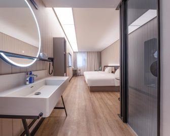 Hanting Hotel Taizhou Gaogang Yangtze River North Road - Taizhou - Bedroom