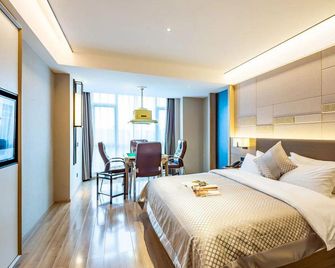 Morning Hotel (Jishou municipal government store) - Xiangxi - Bedroom