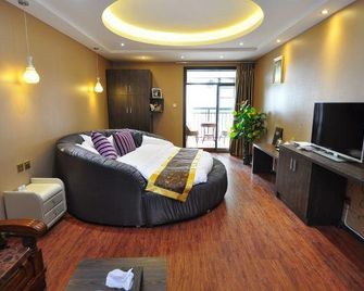 Xiyake Apartment Hostel (kunming Beitai Huayuan) - Kunming - Living room