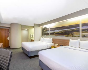 Days Inn by Wyndham Eagan Minnesota Near Mall of America - Eagan - Schlafzimmer