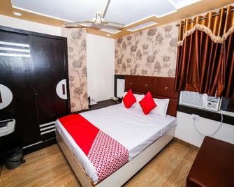 Collection O Hotel Sharda - Гваліор - Спальня