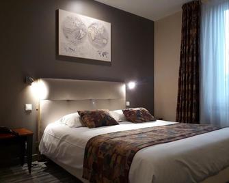 Logis Le Relais de Fusies - Lacaune - Slaapkamer
