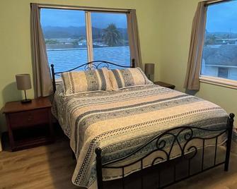 Tranquil 4-bedroom house in Laie with AC, WiFi. Enjoy paradise. - Laie - Phòng ngủ