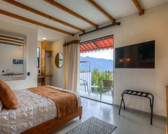 Casa Ehua Hotel Galería - Tepoztlan - Спальня