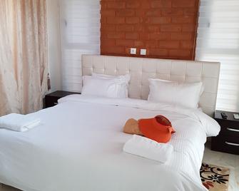 Blue Sky Abissa Lodge 2 - Assinie-Mafia - Camera da letto
