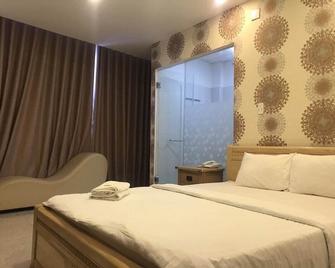 The Eros Hotel - Ho Chi Minh Stadt - Schlafzimmer