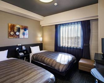 Hotel Route-Inn Nihonmatsu - Nihonmatsu - Schlafzimmer