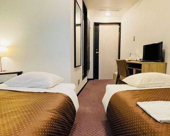 Business Hotel Kudamatsu - Kudamatsu - Bedroom