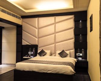 Corbett Wild Iris Spa And Resort - Belparāo - Habitación