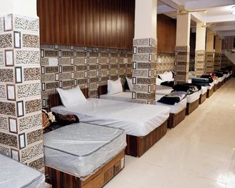Tirupati Balaji Inn Bageshwar Dham - Khajuraho - Schlafzimmer