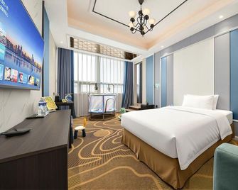Tiancheng Holiday Hotel (Nanchong Renmin Garden) - Nanchong - Camera da letto
