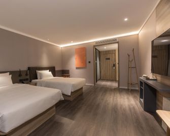Hanting Hotel Zhenjiang Railway Station North Square - Zhenjiang - Camera da letto
